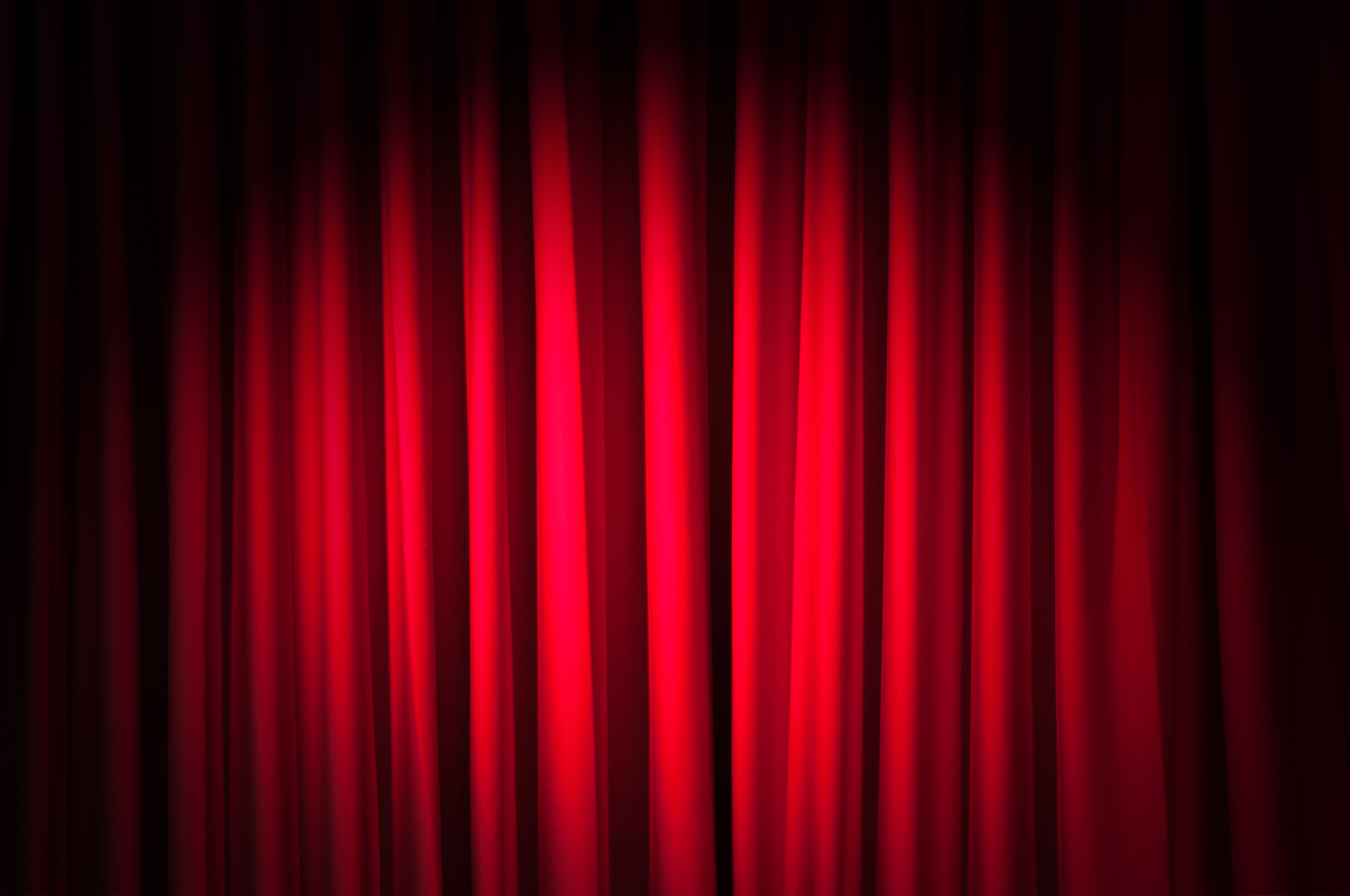 Brightly Lit Curtains in Theatre Concept